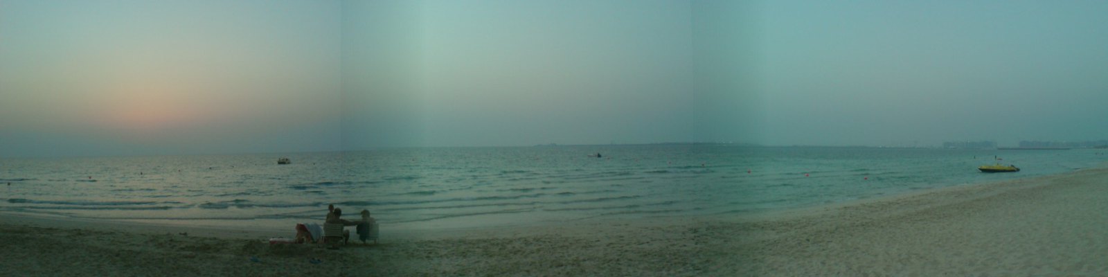 Beach at sunset (rubbish panorama, that)